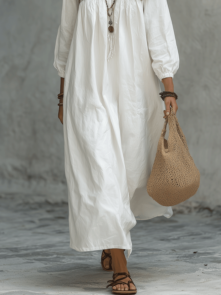 Vestido Maxi Blanco Bohemio con Bordado Floral y Mangas de Globo