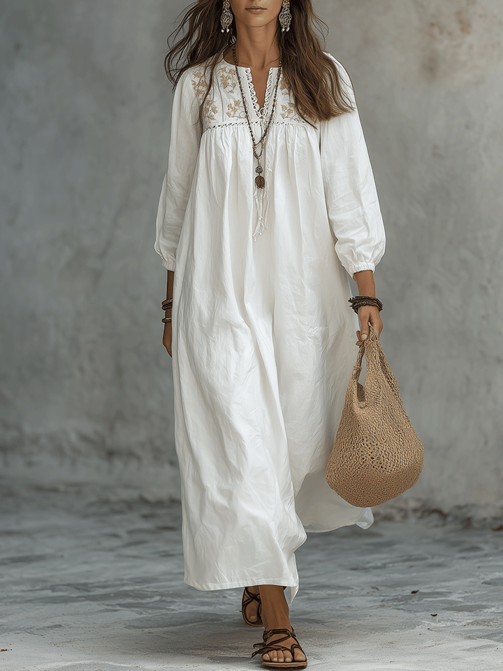 Vestido Maxi Blanco Bohemio con Bordado Floral y Mangas de Globo